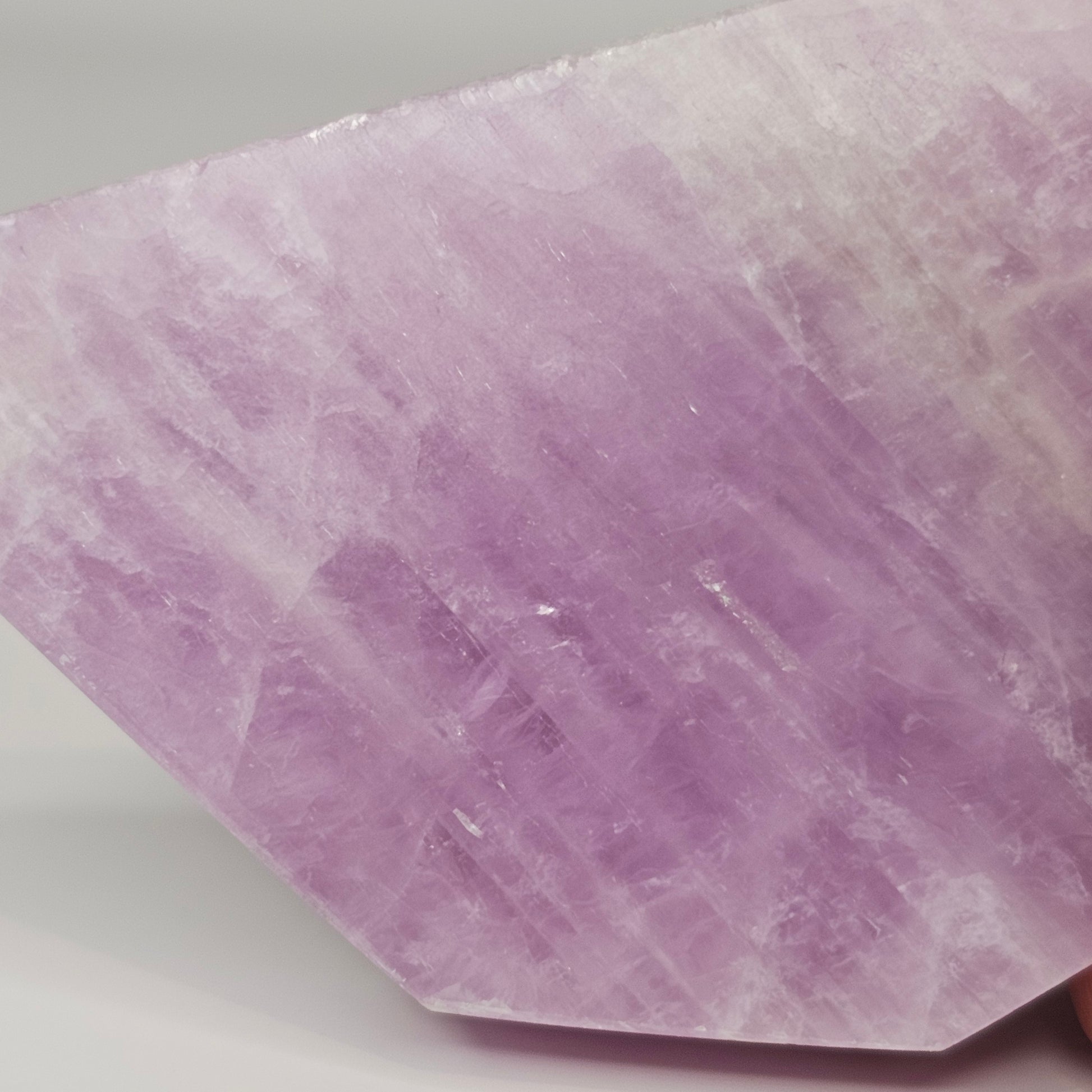 Gorgeous Kunzite slab from Afghanistan. Self-standing on all sides.