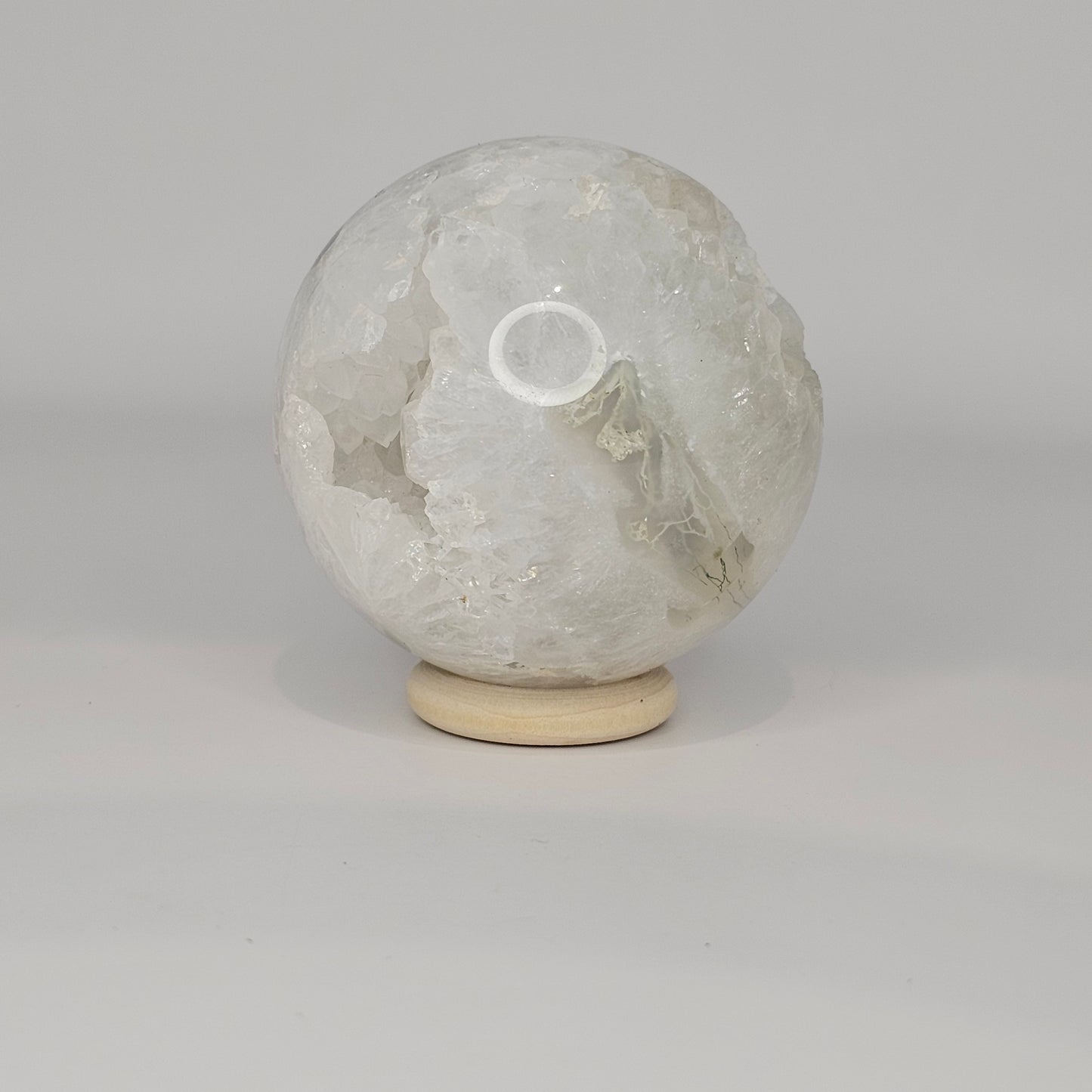 Beautiful high quality sphere with large Quartz teeth and Moss Agate.