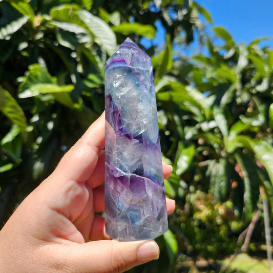 Large Fluorite tower with vibrant blue, purple and green banding, and gorgeous rainbows throughout.