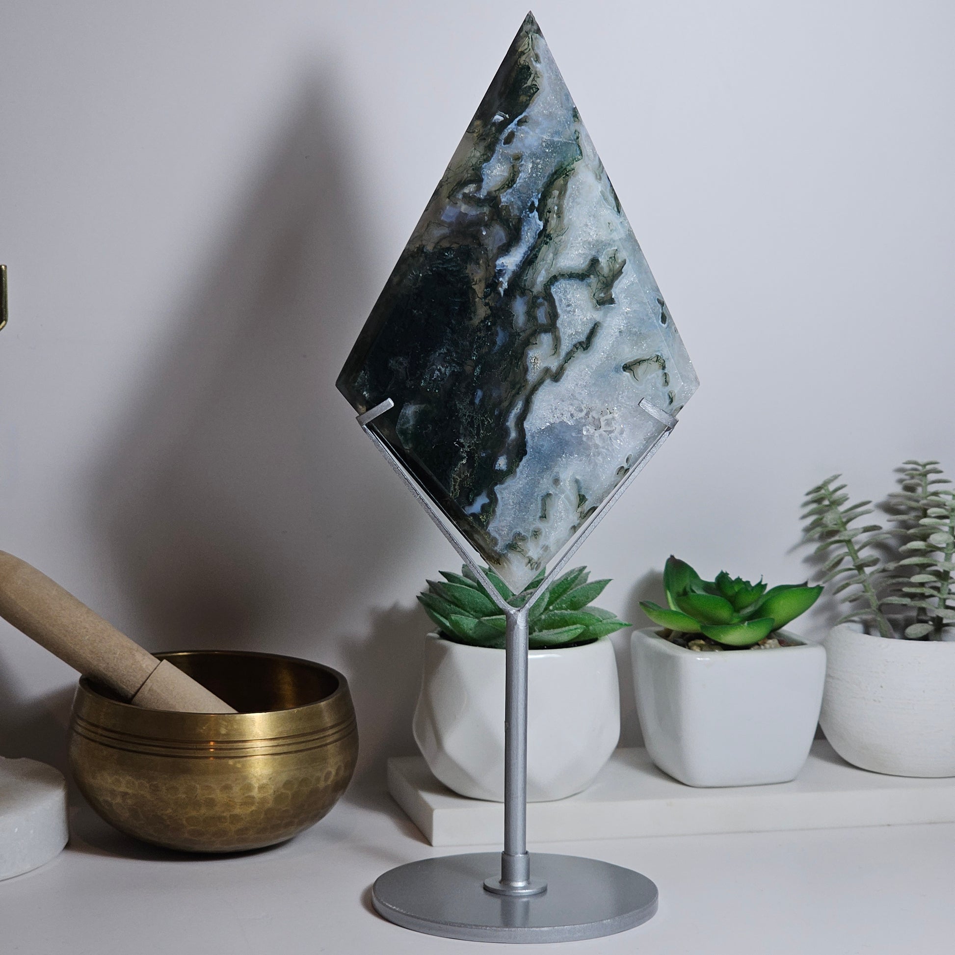 24.5cm beautiful display piece, this diamond shaped Moss Agate carving comes with its own custom matte silver stand.