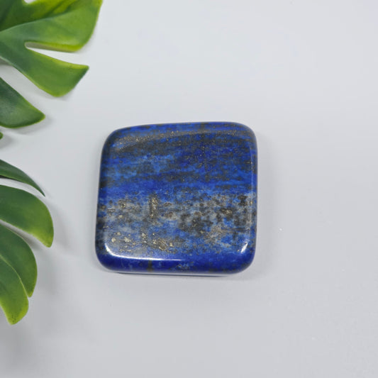 AA Grade Lapis Lazuli polished tumble stone with deep royal blue colour and natural golden Pyrite speckles.