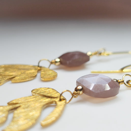 Brushed brass leaf charms suspended from silver flash Chocolate Moonstones beads, hanging from gold toned stainless steel ear wires.