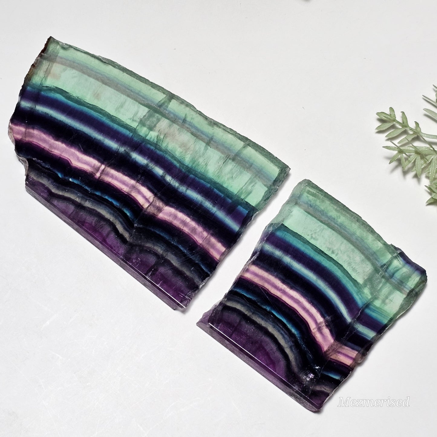Both Fluorite slab pieces laid flat side by side showing break separation.