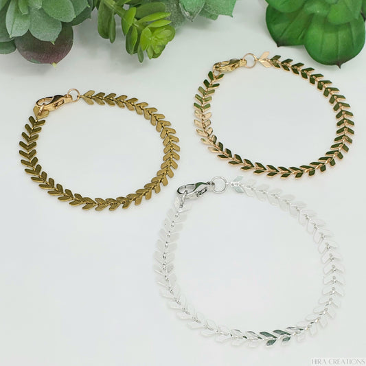 Chevron Bracelets (clockwise from top left): Gold, Rose Gold, Silver.