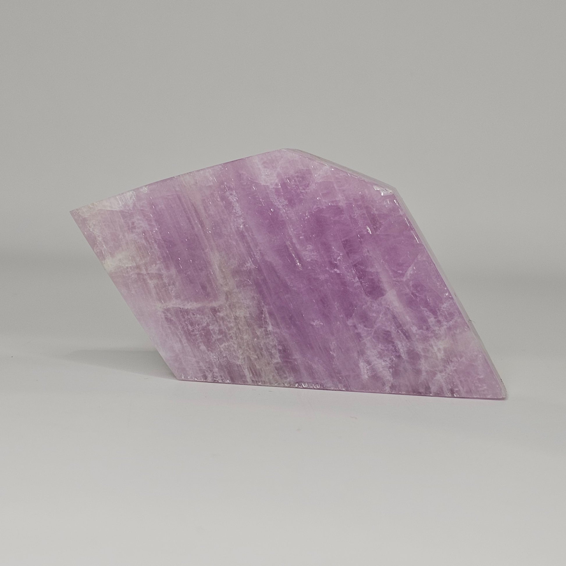 Gorgeous Kunzite slab from Afghanistan. Self-standing on all sides.