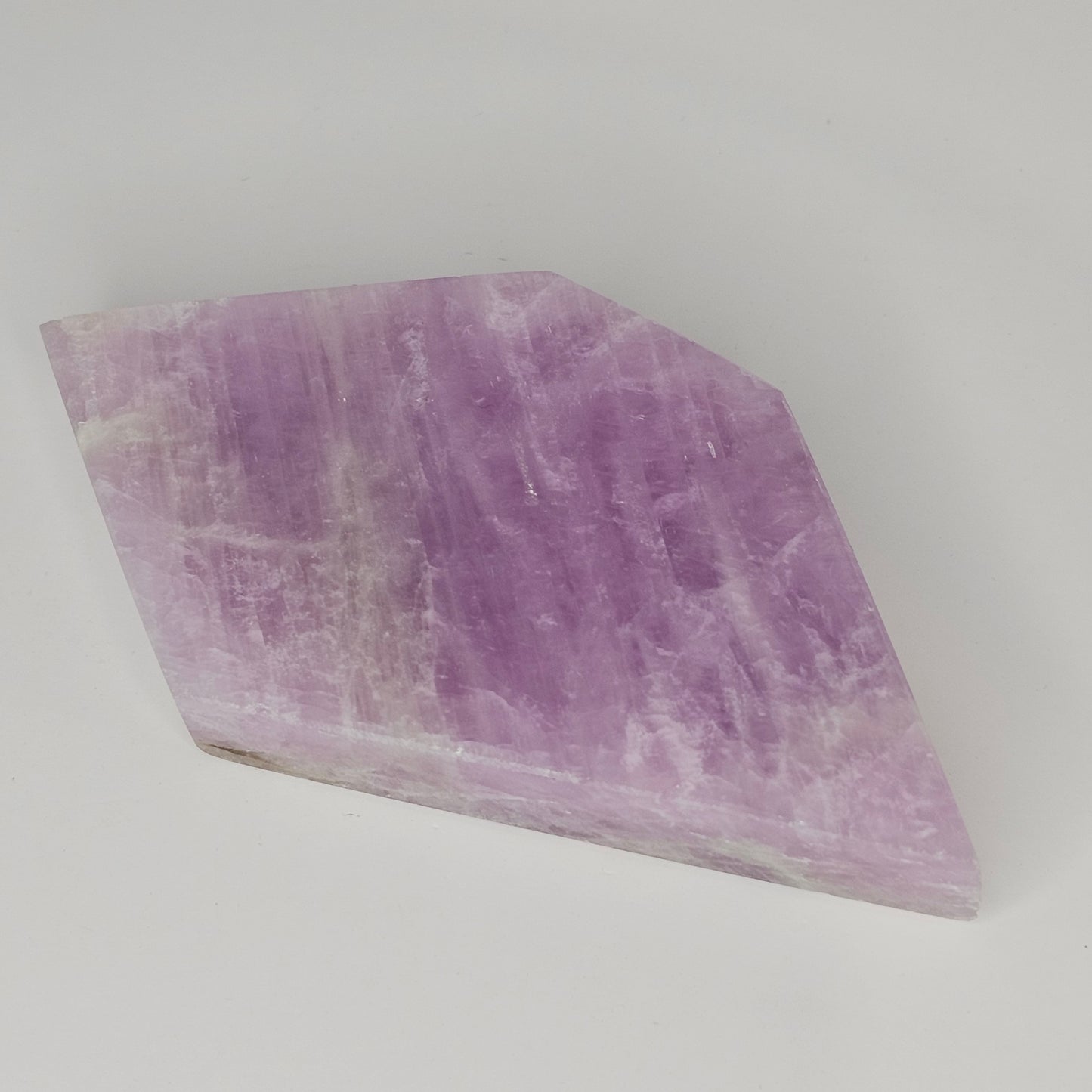 Gorgeous Kunzite slab from Afghanistan. Self-standing on all sides.