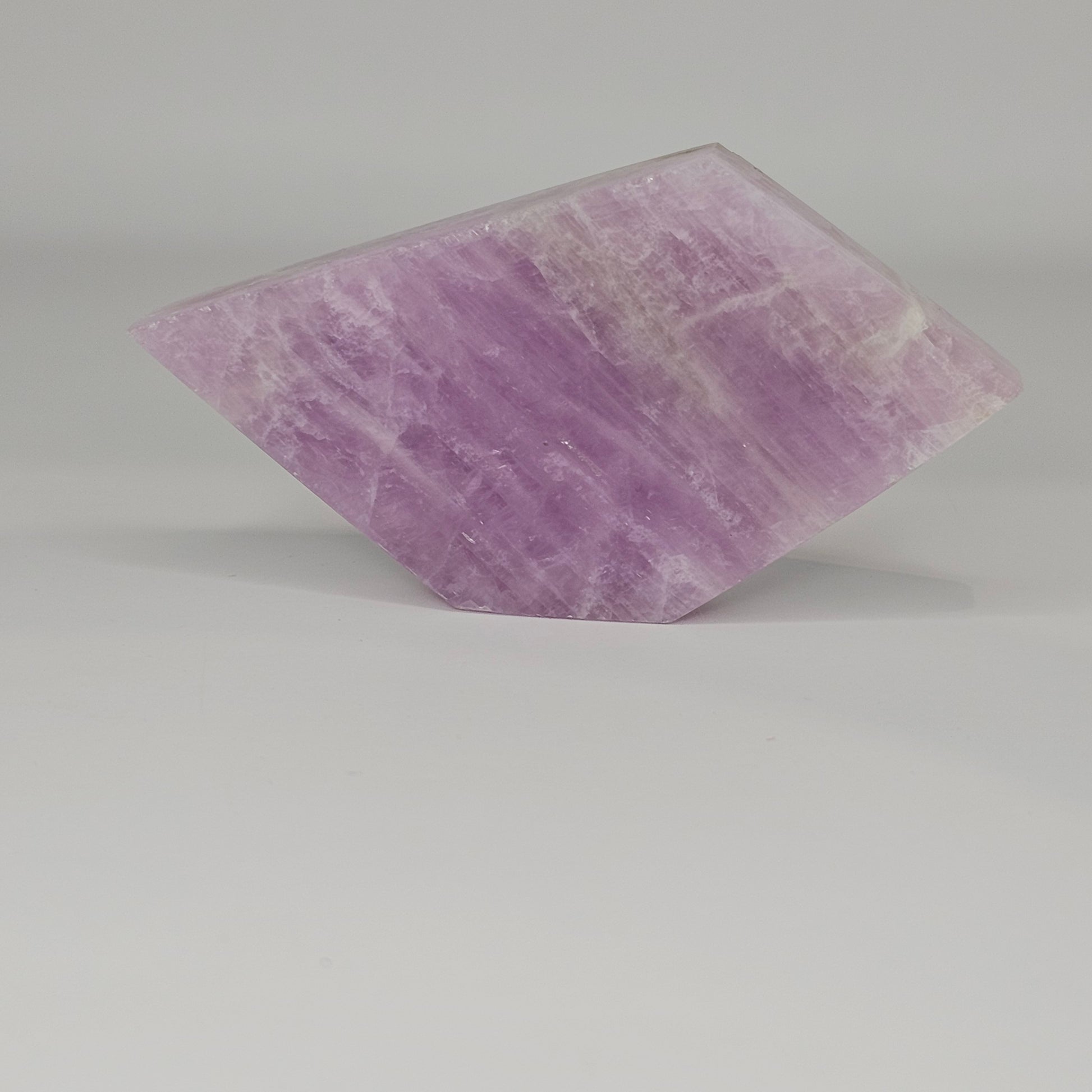 Gorgeous Kunzite slab from Afghanistan. Self-standing on all sides.