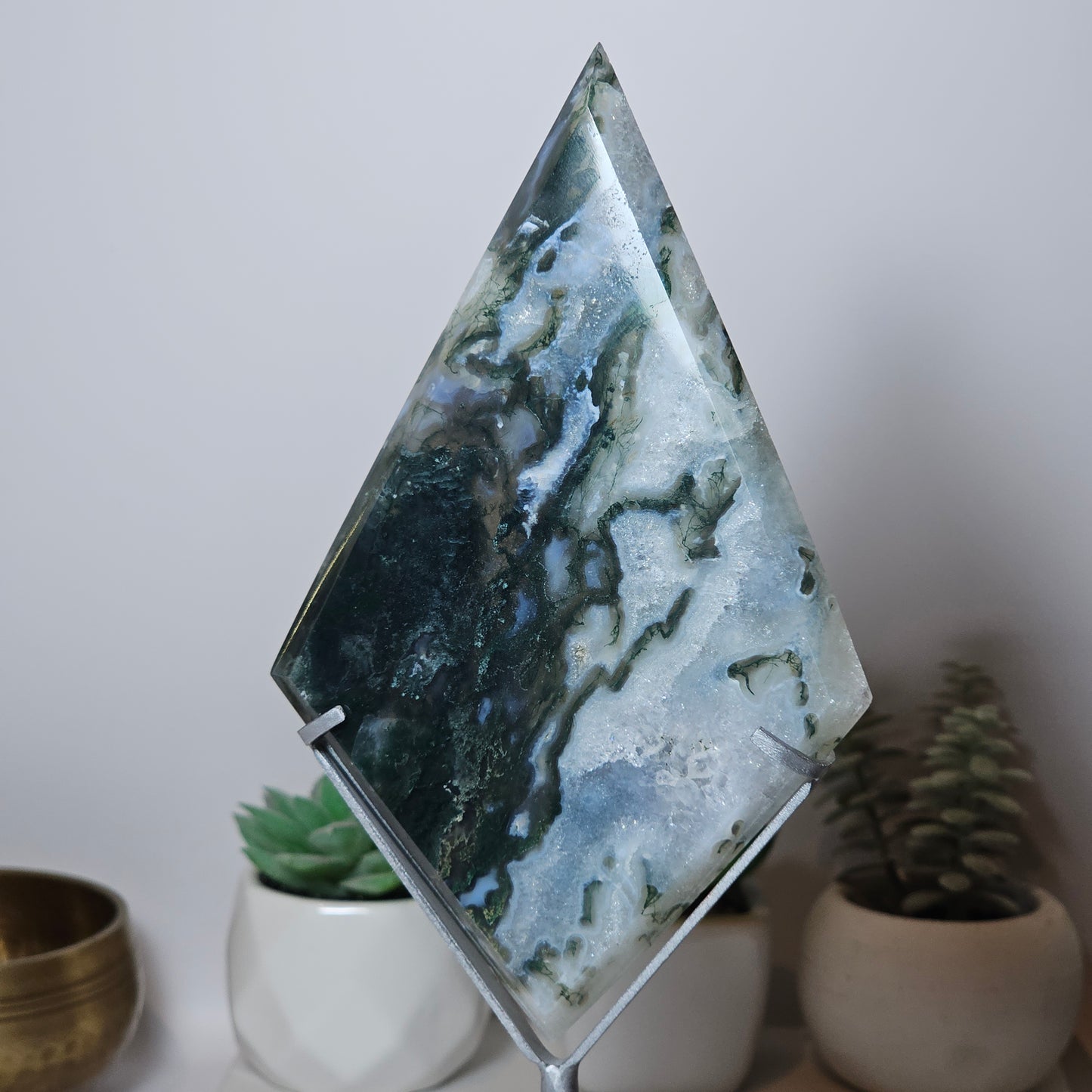 24.5cm beautiful display piece, this diamond shaped Moss Agate carving comes with its own custom matte silver stand.