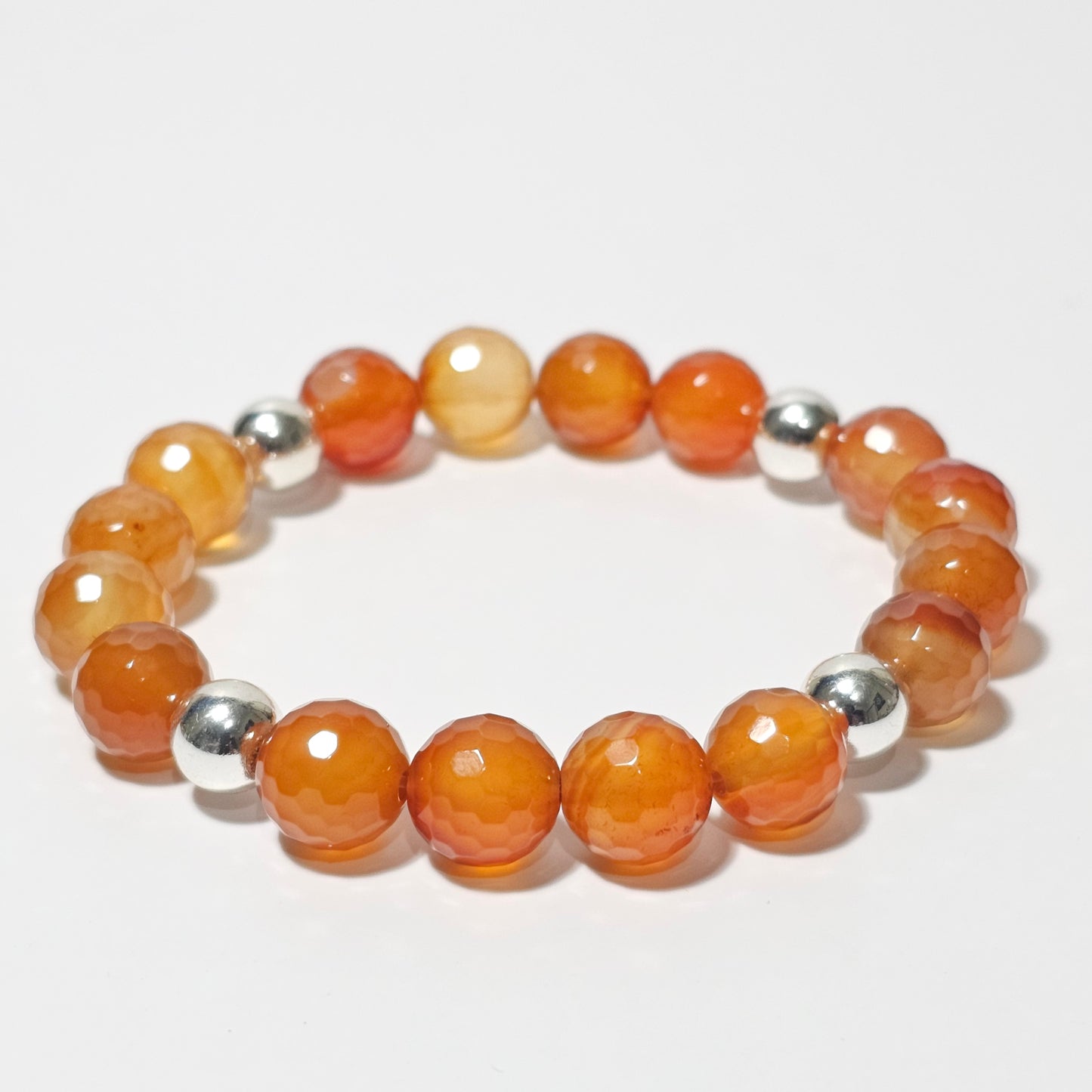 10mm Faceted gorgeous Carnelian and silver plated Hematite bead stretch bracelet.