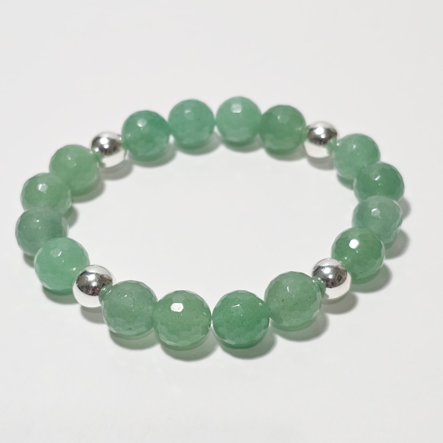 10mm Faceted stunning Green Aventurine and silver plated Hematite bead stretch bracelet.