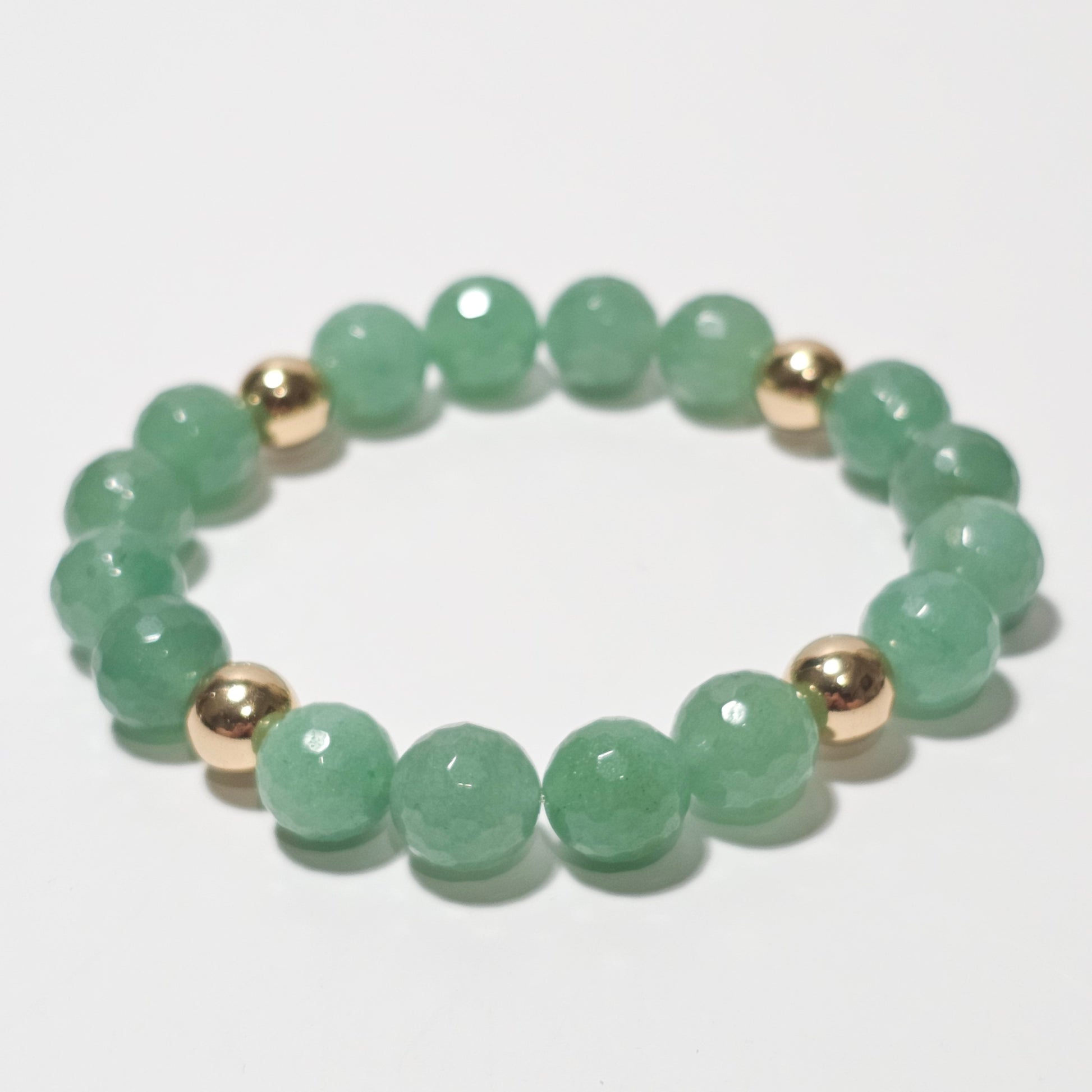 10mm Faceted stunning Green Aventurine and gold plated Hematite bead stretch bracelet.