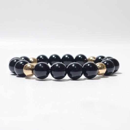 10mm Elegant Onyx and gold plated Hematite bead stretch bracelet.