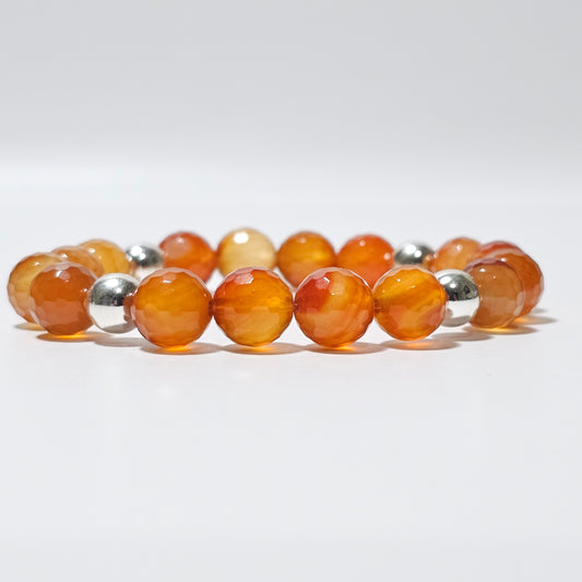 10mm Faceted gorgeous Carnelian and silver plated Hematite bead stretch bracelet.