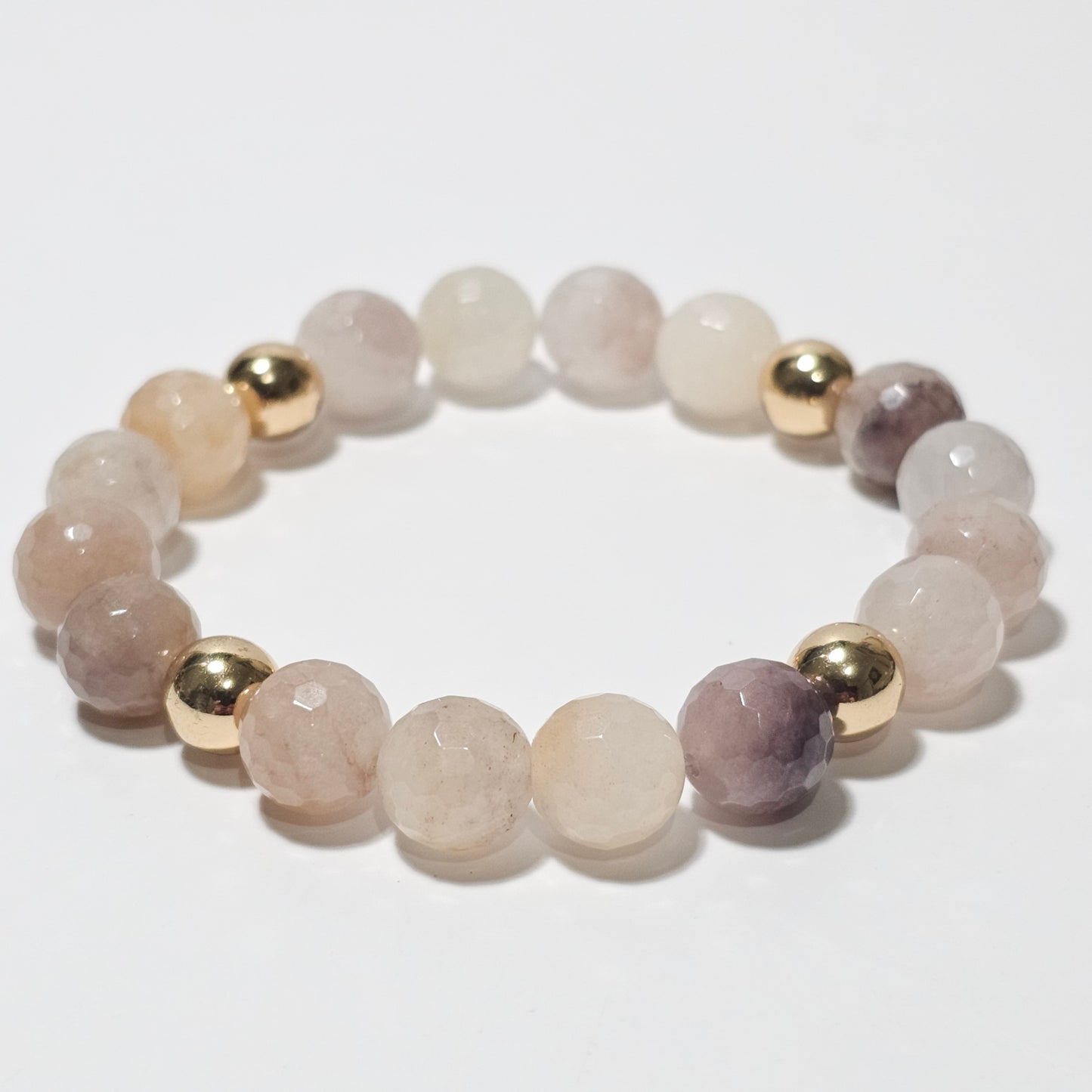 10mm faceted beautiful Quartz and gold plated Hematite bead stretch bracelet.