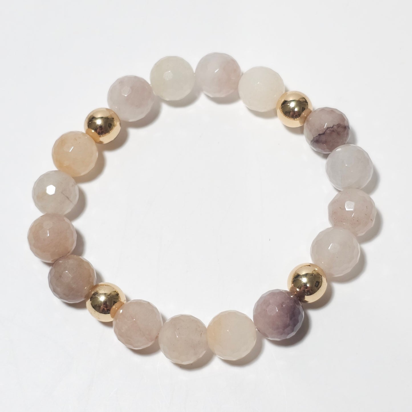 10mm faceted beautiful Quartz and gold plated Hematite bead stretch bracelet.