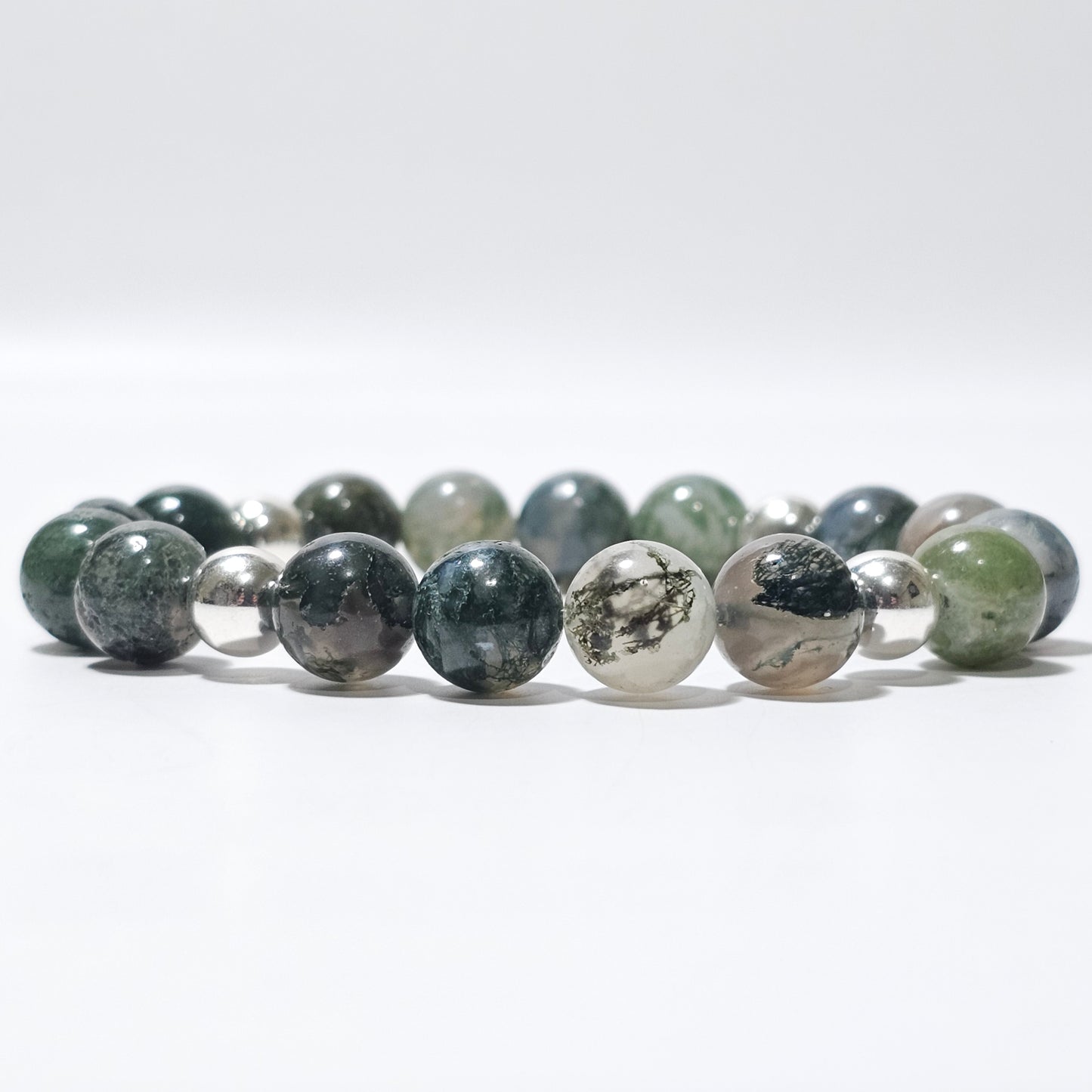 10mm Mesmerising Moss Agate and silver plated Hematite bead stretch bracelet.