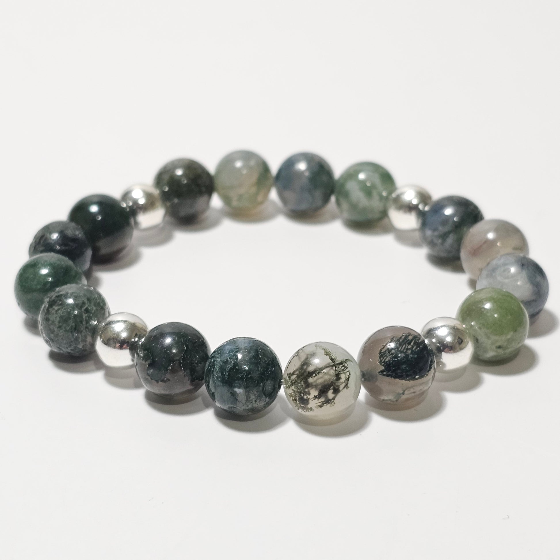 10mm Mesmerising Moss Agate and silver plated Hematite bead stretch bracelet.