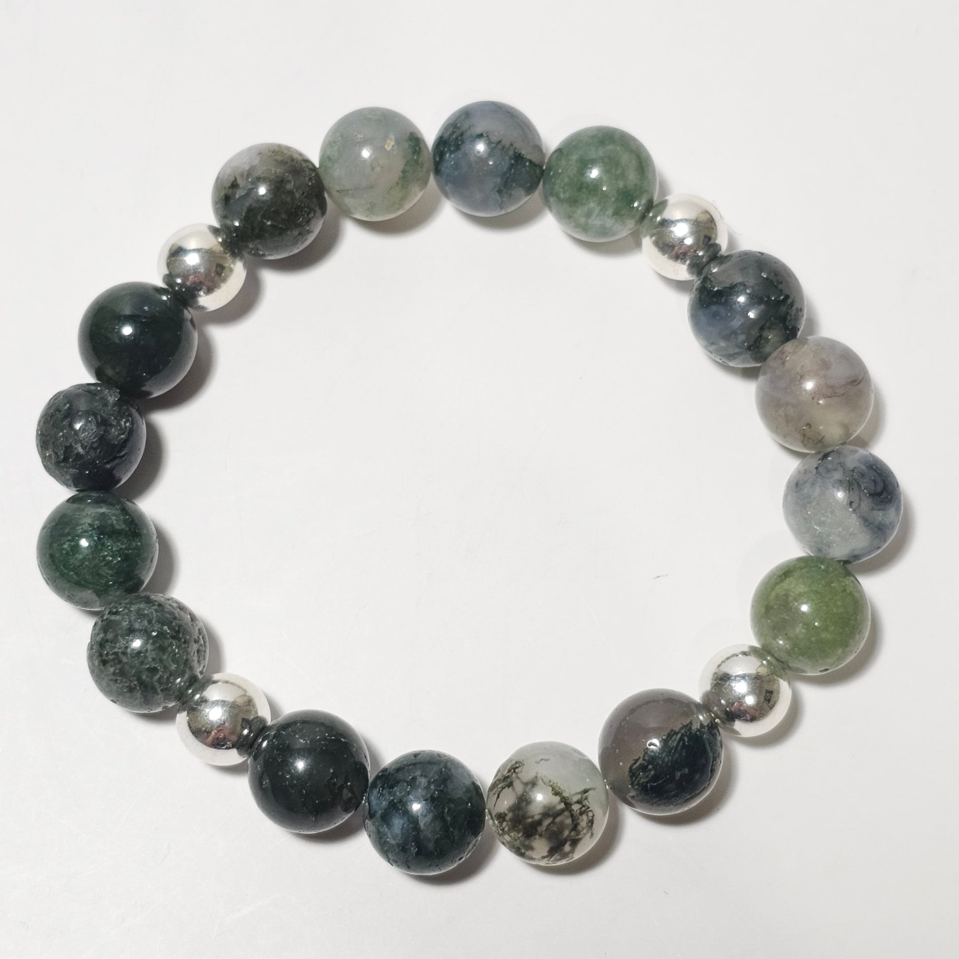 10mm Mesmerising Moss Agate and silver plated Hematite bead stretch bracelet.