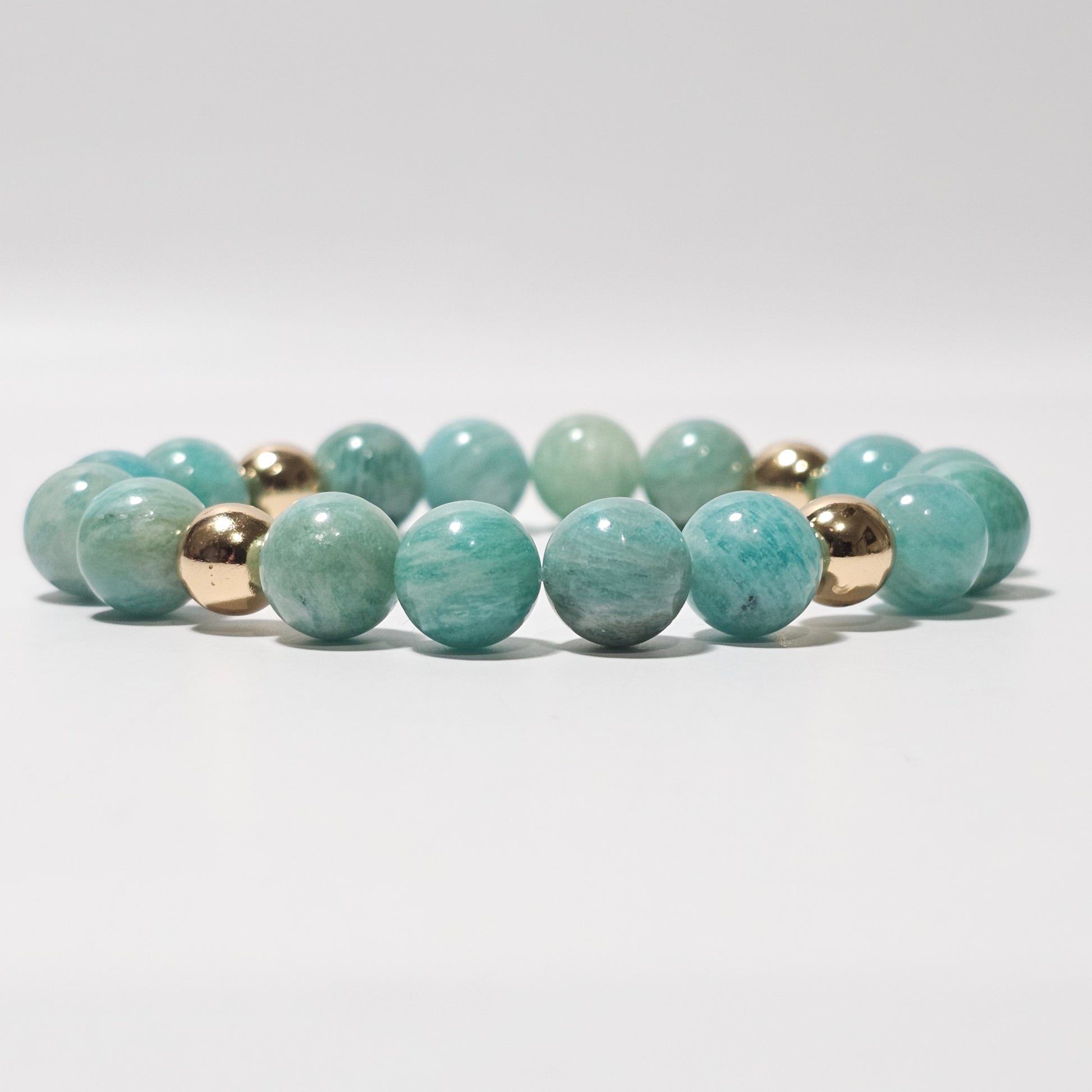 10mm Captivating Amazonite and gold plated Hematite bead stretch bracelet.