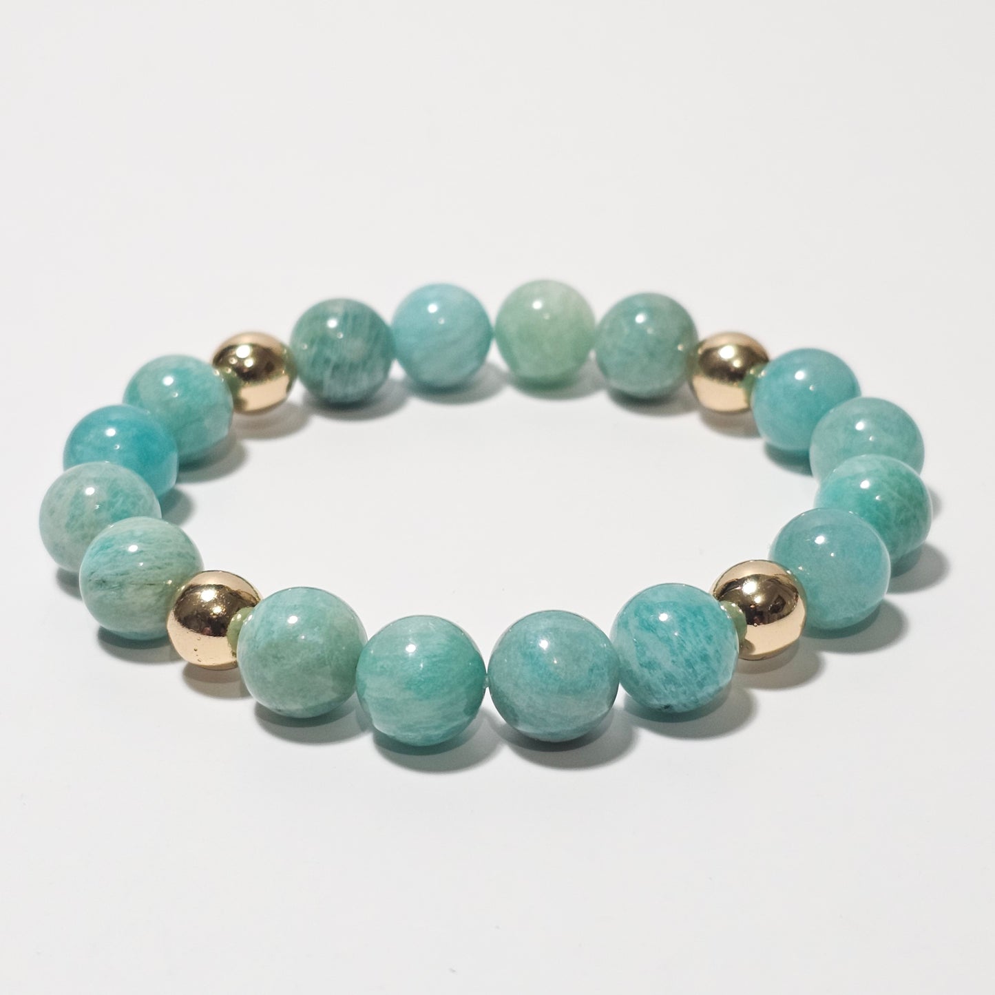 10mm Captivating Amazonite and gold plated Hematite bead stretch bracelet.