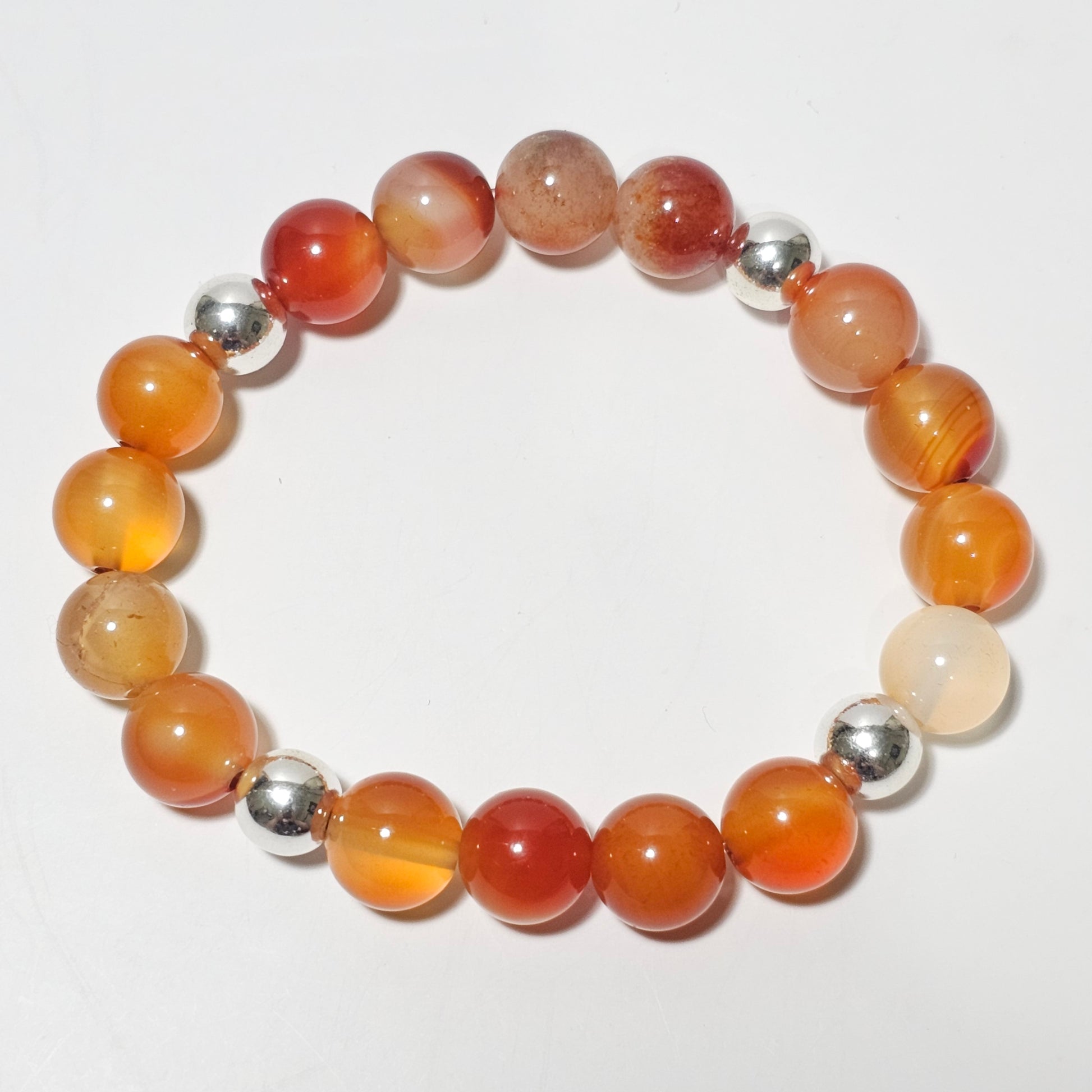 10mm Gorgeous A grade Carnelian and silver plated Hematite bead stretch bracelet.