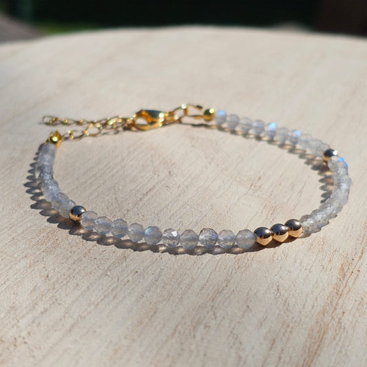 Delicate, faceted dainty Labradorite and AAA grade gold plated Hematite bead bracelet with a gold stainless steel clasp and extender chain.