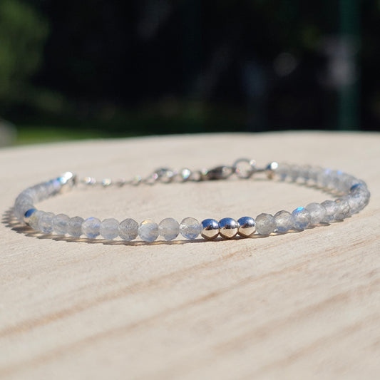 Delicate, faceted dainty Labradorite and AAA grade silver plated Hematite bead bracelet with a silver stainless steel clasp and extender chain.