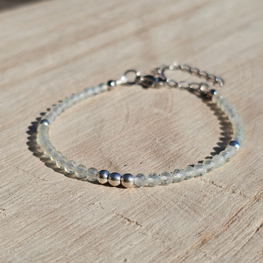 Delicate, faceted dainty Prehnite and AAA grade silver plated Hematite bead bracelet with a silver stainless steel clasp and extender chain.