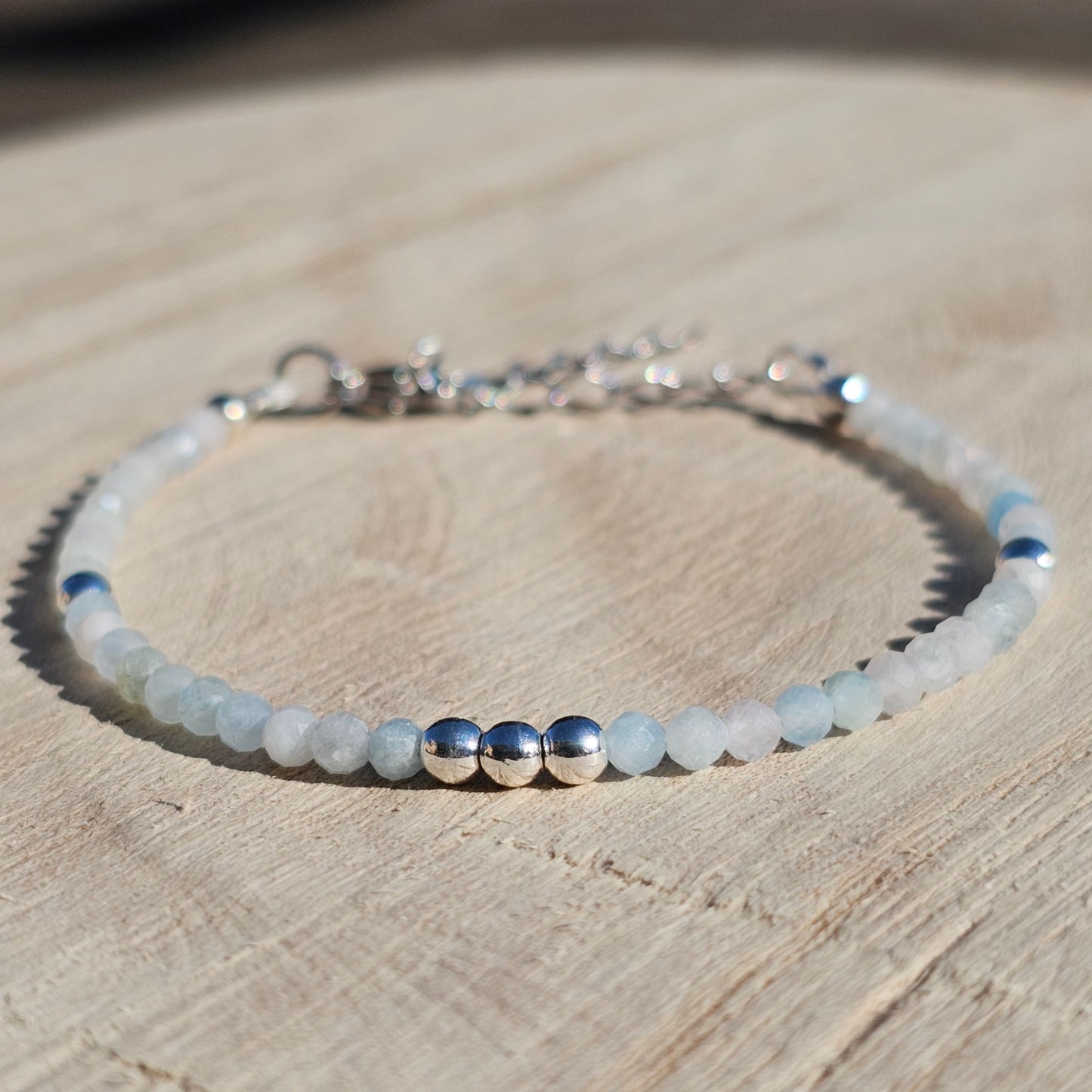 Delicate, faceted dainty Morganite and AAA grade silver plated Hematite bead bracelet with a silver stainless steel clasp and extender chain.