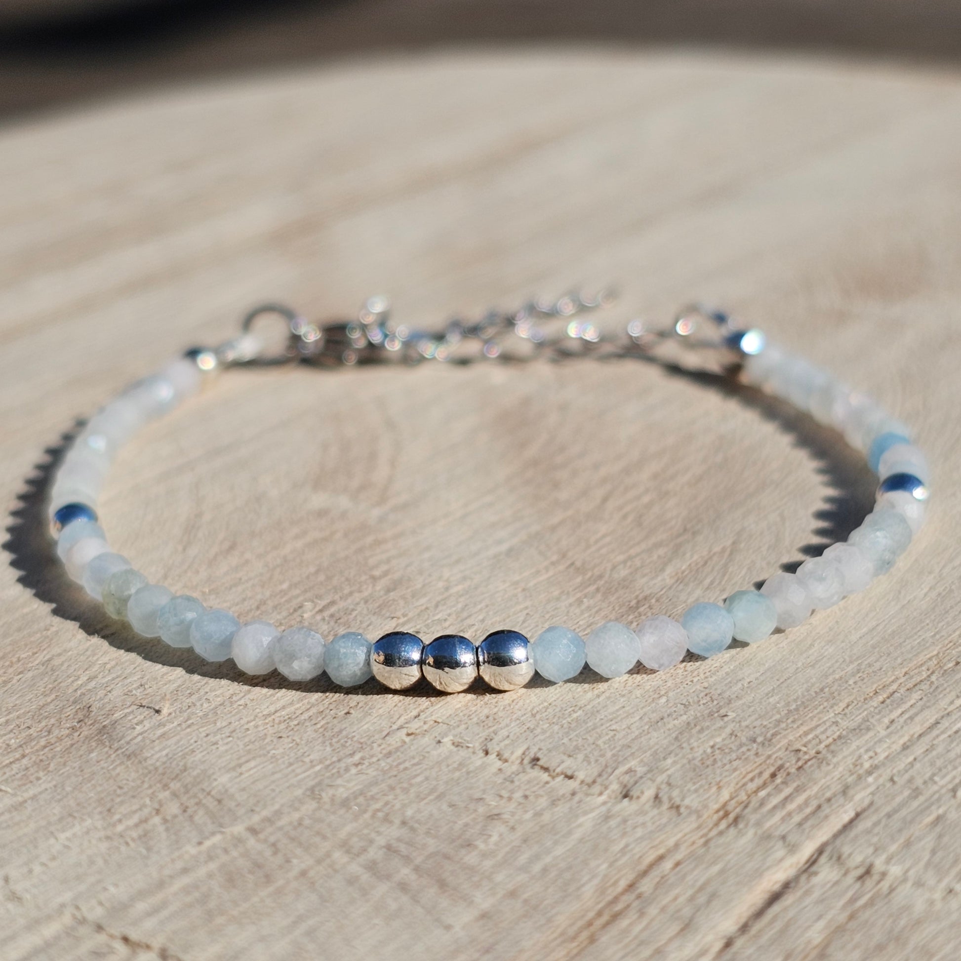 Delicate, faceted dainty Morganite and AAA grade silver plated Hematite bead bracelet with a silver stainless steel clasp and extender chain.