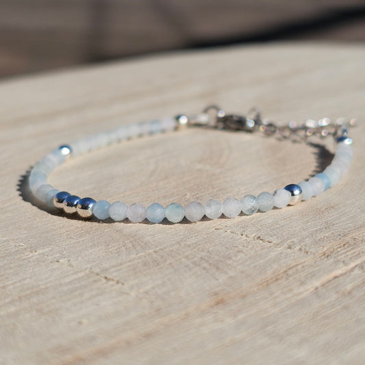 Delicate, faceted dainty Morganite and AAA grade silver plated Hematite bead bracelet with a silver stainless steel clasp and extender chain.