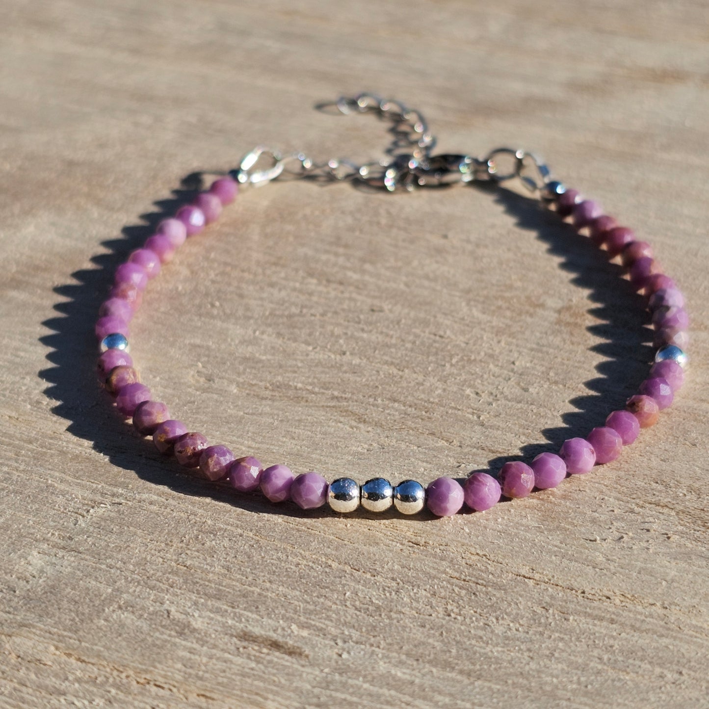 Delicate, faceted dainty Lepidolite and AAA grade silver plated Hematite bead bracelet with a silver stainless steel clasp and extender chain.