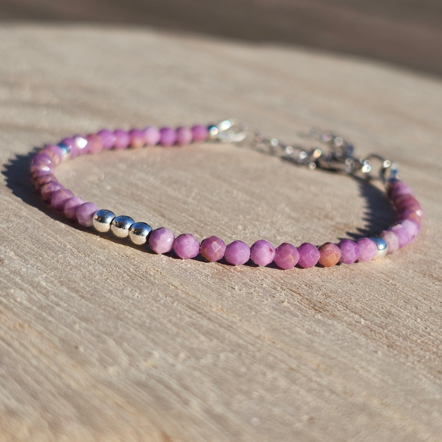 Delicate, faceted dainty Lepidolite and AAA grade silver plated Hematite bead bracelet with a silver stainless steel clasp and extender chain.