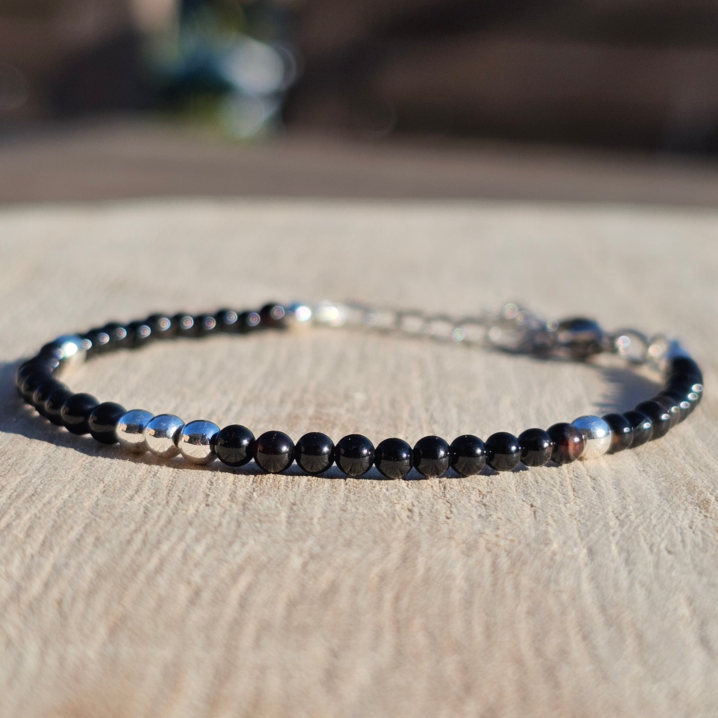 Delicate, round dainty Agate and AAA grade silver plated Hematite bead bracelet with a silver stainless steel clasp and extender chain.