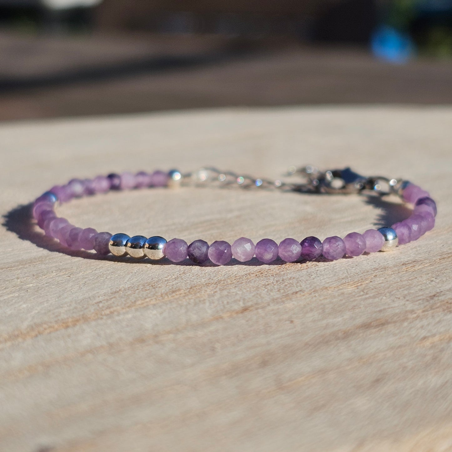 Delicate, faceted dainty Lepidolite and AAA grade silver plated Hematite bead bracelet with a silver stainless steel clasp and extender chain.