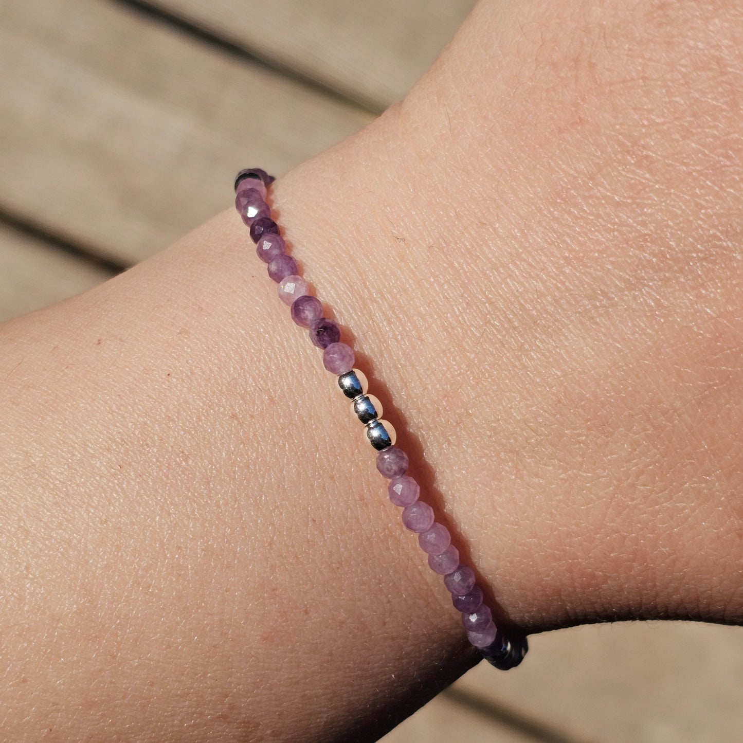 Delicate, faceted dainty Lepidolite and AAA grade silver plated Hematite bead bracelet with a silver stainless steel clasp and extender chain.