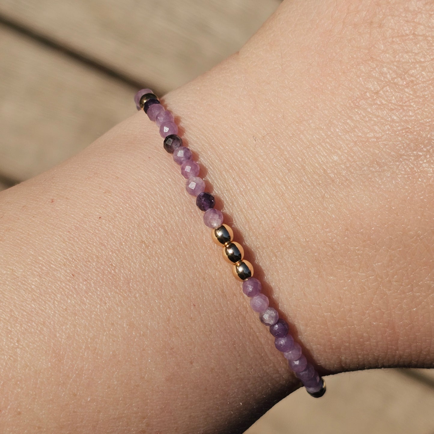 Delicate, faceted dainty Lepidolite and AAA grade gold plated Hematite bead bracelet with a gold stainless steel clasp and extender chain.