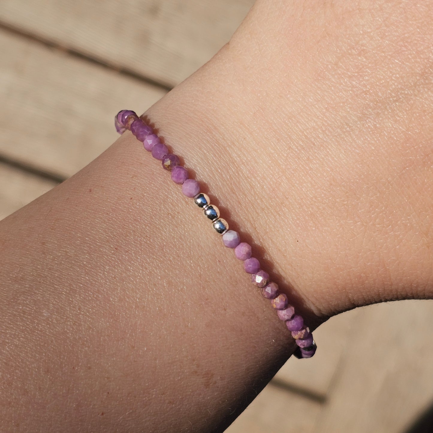 Delicate, faceted dainty Lepidolite and AAA grade silver plated Hematite bead bracelet with a silver stainless steel clasp and extender chain.