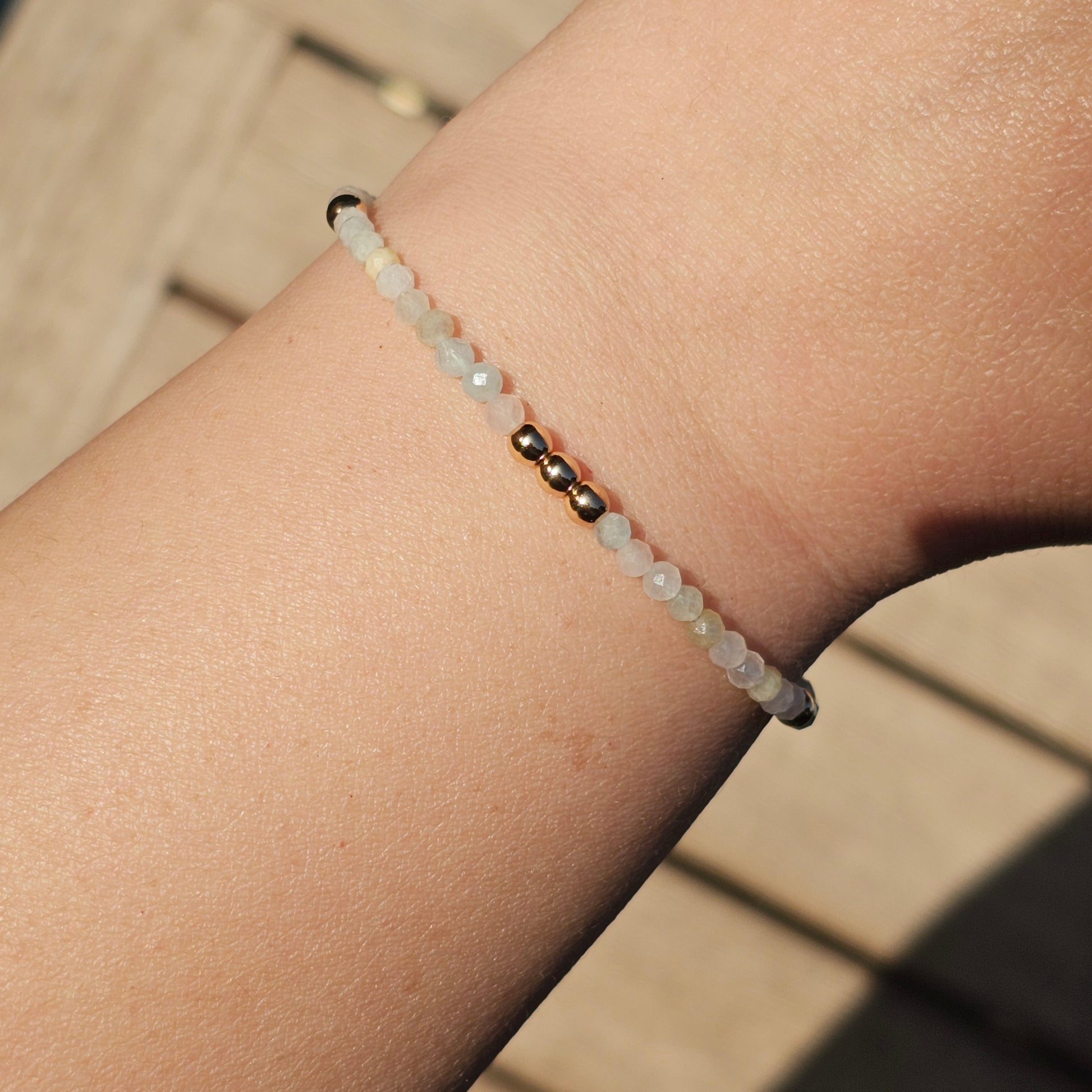 Delicate, faceted dainty Morganite and AAA grade gold plated Hematite bead bracelet with a gold stainless steel clasp and extender chain.