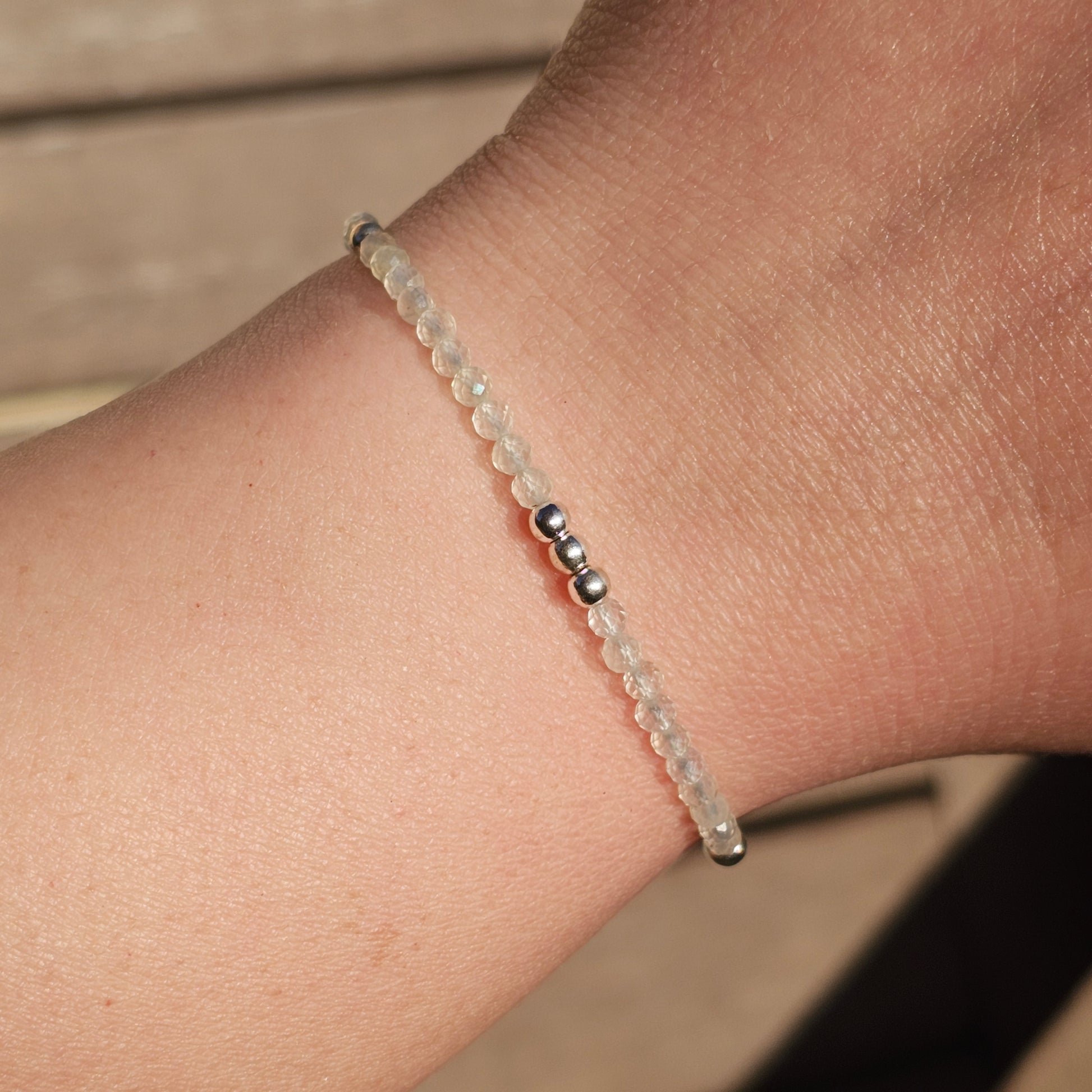 Delicate, faceted dainty Prehnite and AAA grade silver plated Hematite bead bracelet with a silver stainless steel clasp and extender chain.