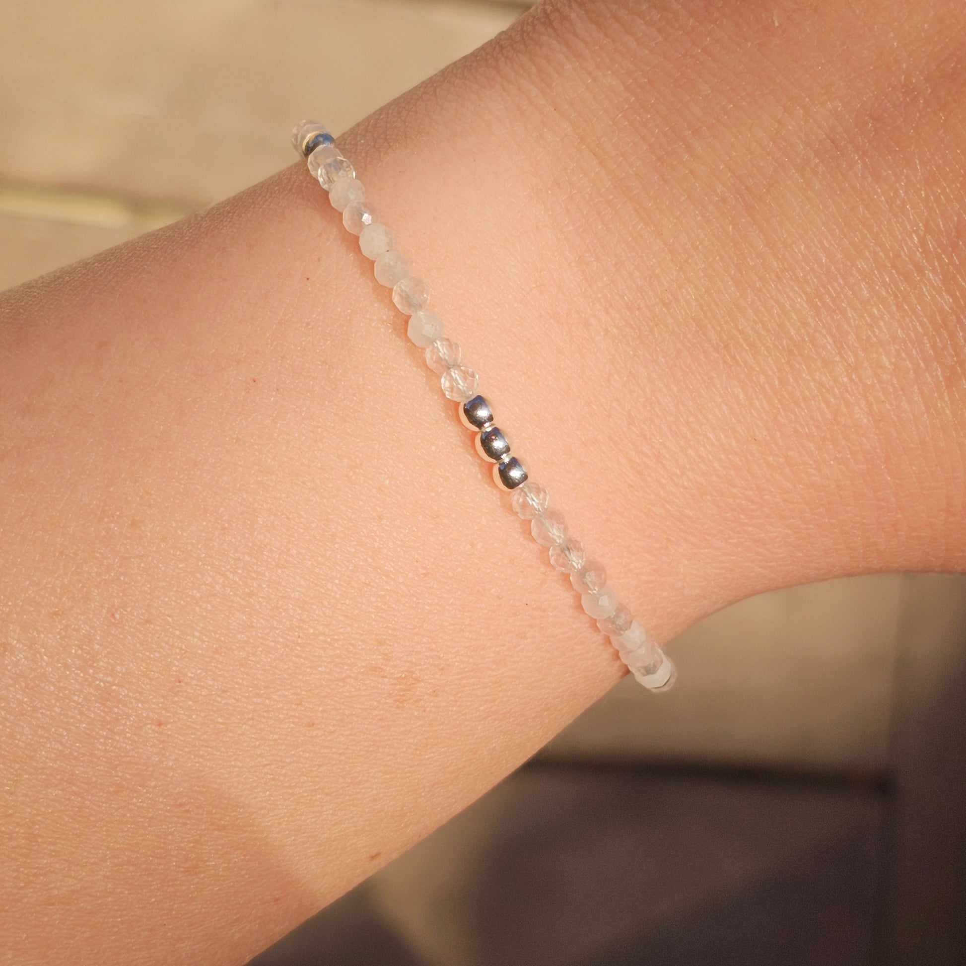 Delicate, faceted dainty Rose Quartz and AAA grade silver plated Hematite bead bracelet with a silver stainless steel clasp and extender chain.