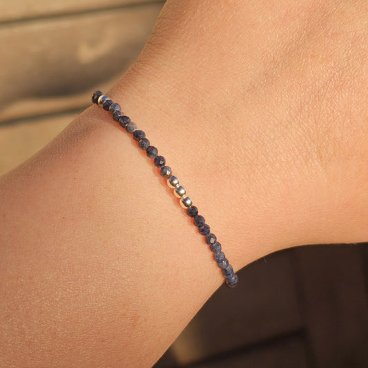 Delicate, faceted dainty A grade Sapphire and AAA grade silver plated Hematite bead bracelet with a silver stainless steel clasp and extender chain.