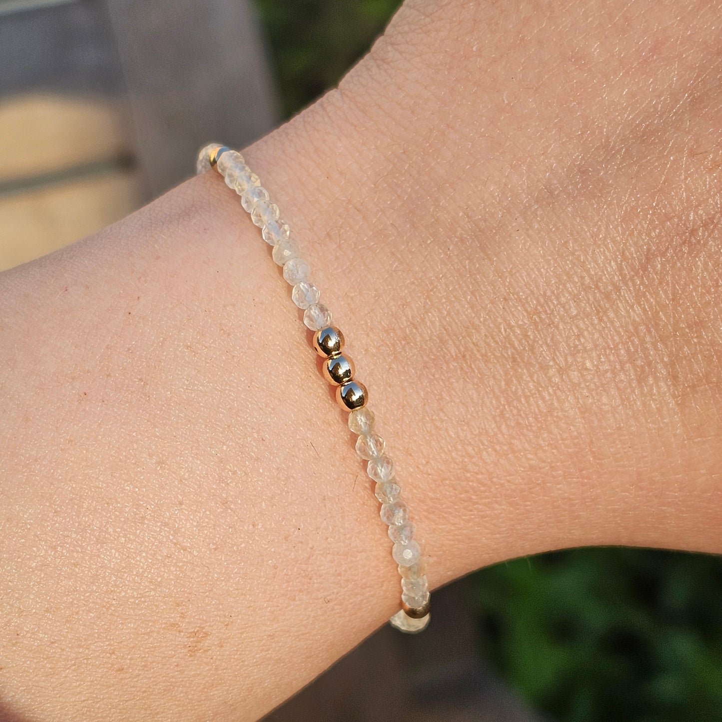 Delicate, faceted dainty Citrine and AAA grade gold plated Hematite bead bracelet with a gold stainless steel clasp and extender chain.