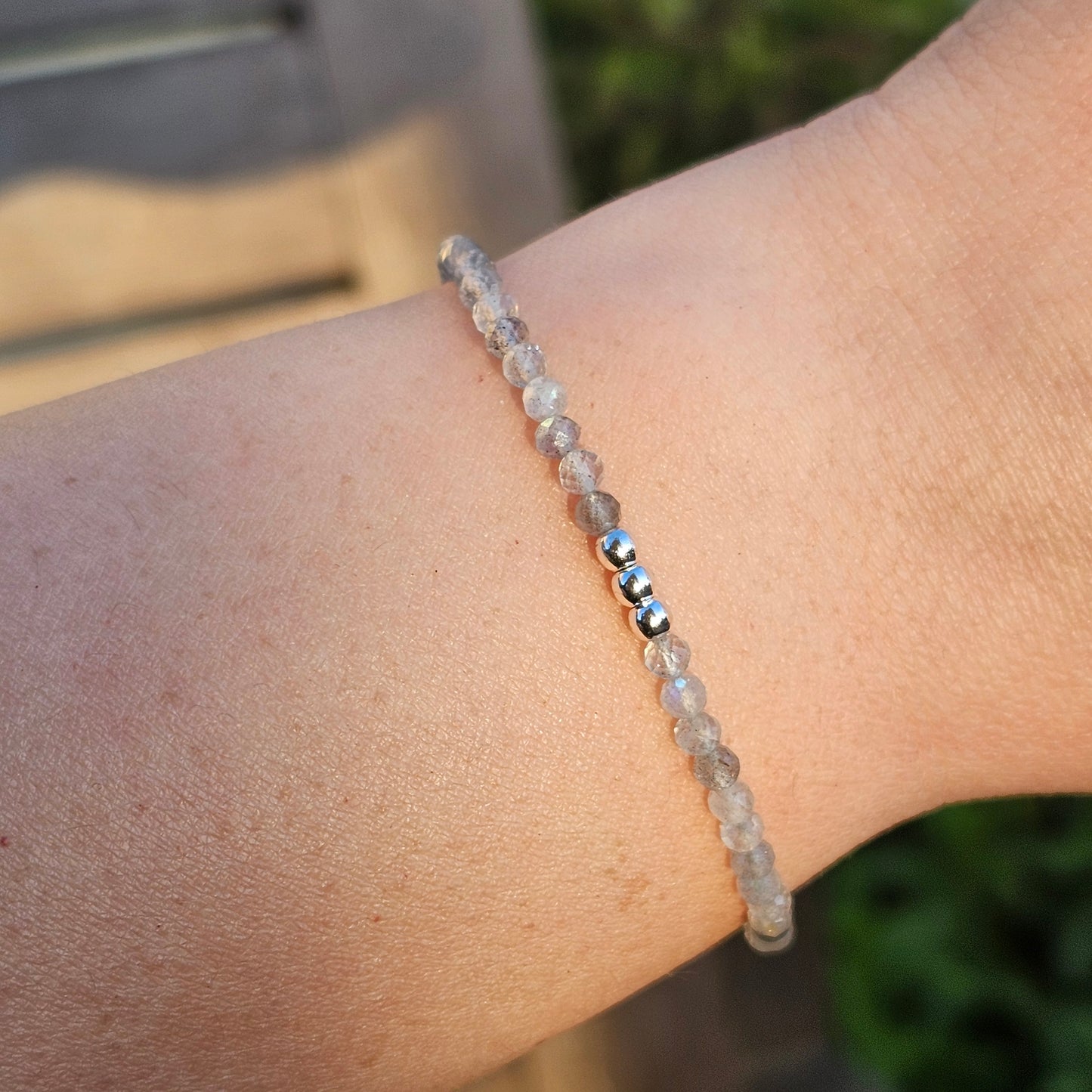 Delicate, faceted dainty Labradorite and AAA grade silver plated Hematite bead bracelet with a silver stainless steel clasp and extender chain.