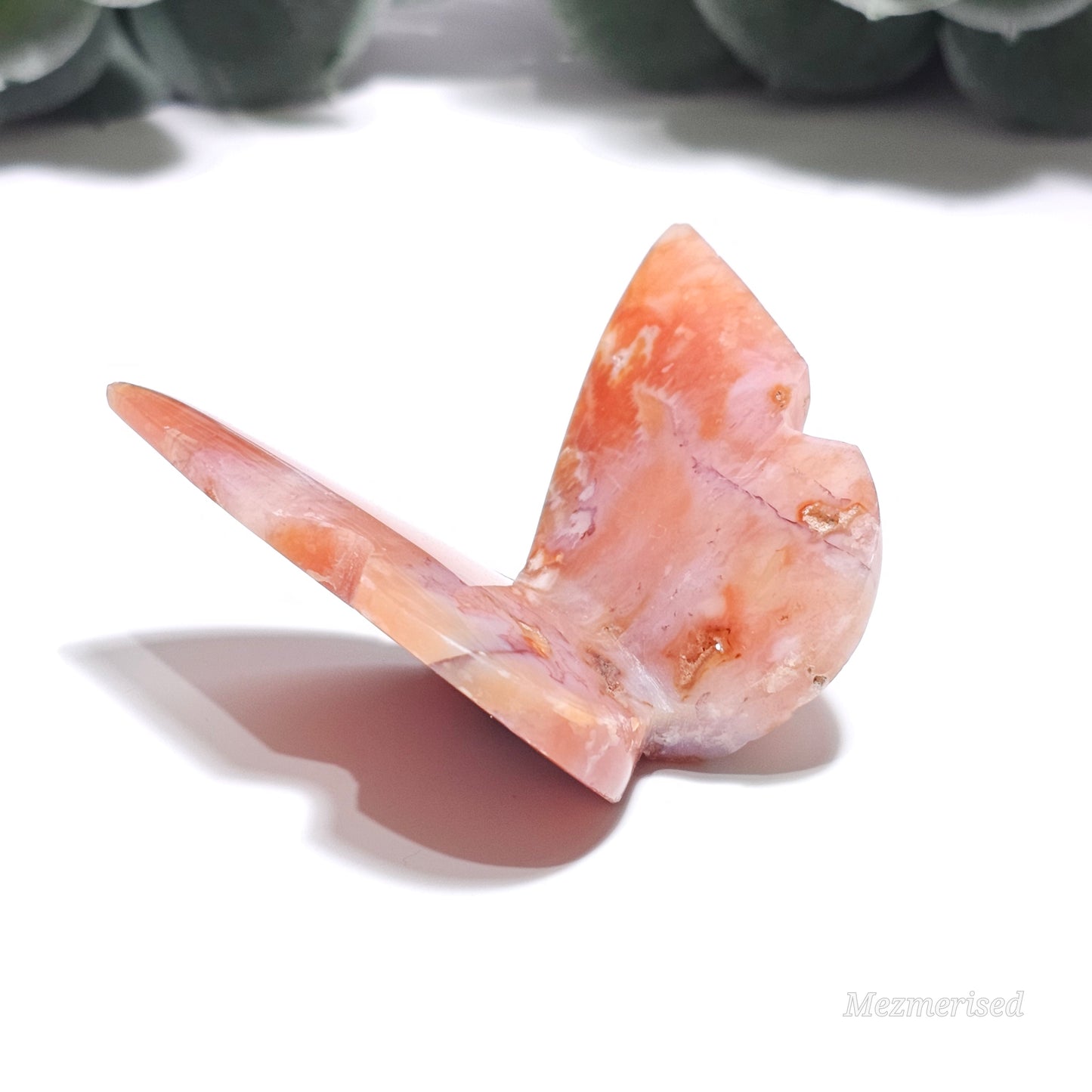 Beautiful rare pink Carnelian butterfly carving.