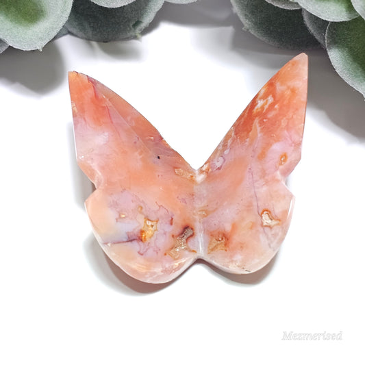 Beautiful rare pink Carnelian butterfly carving.