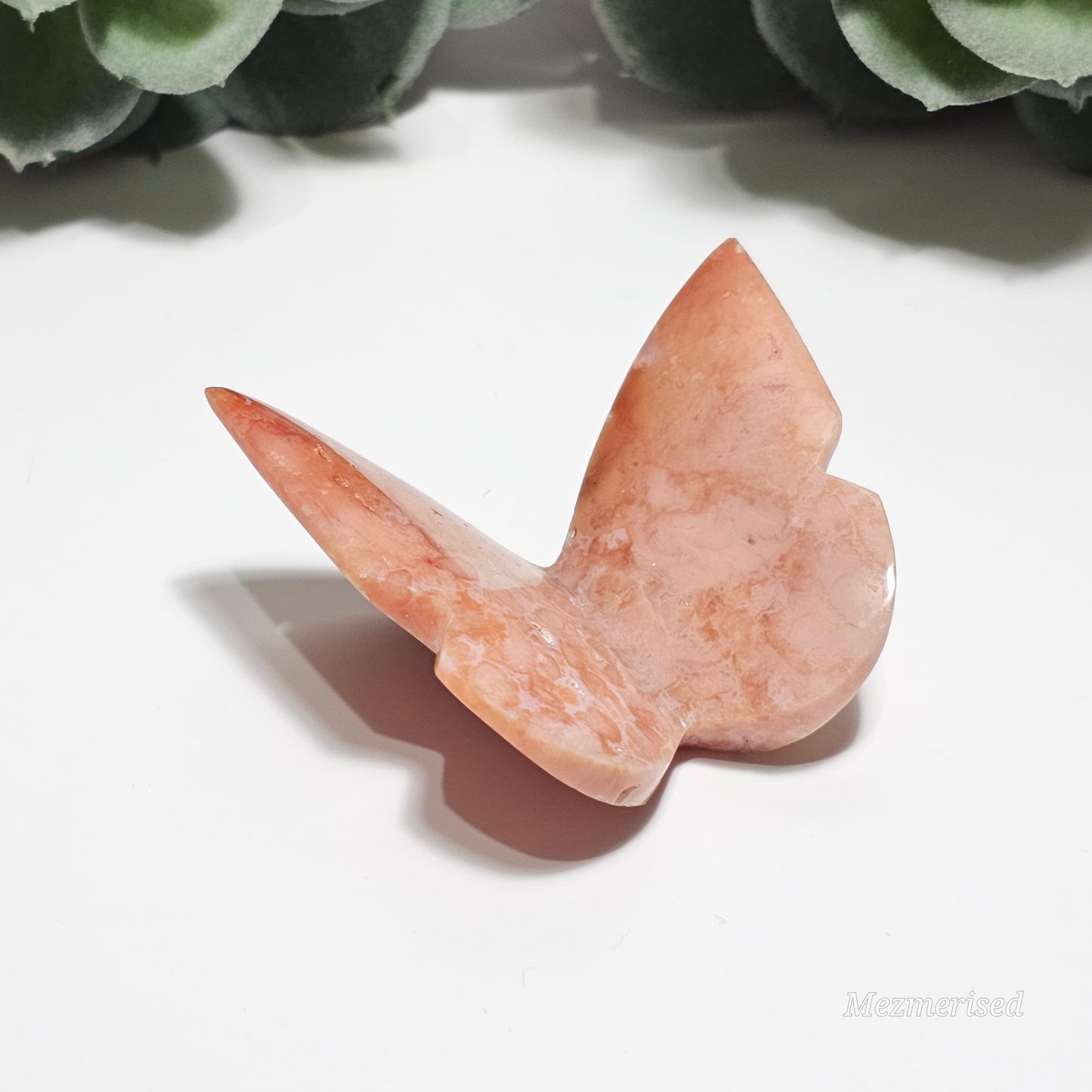 Beautiful rare pink Carnelian butterfly carving.