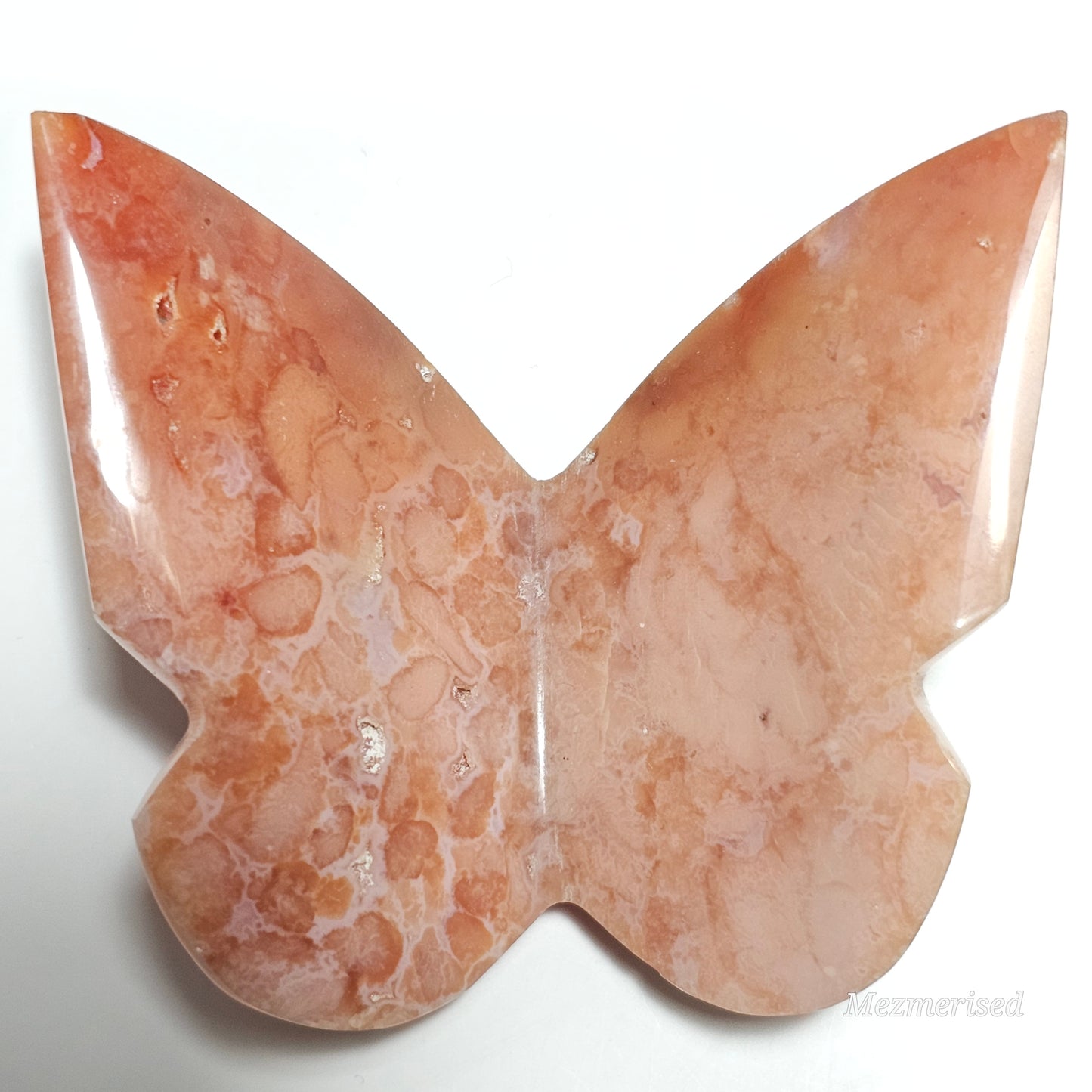 Beautiful rare pink Carnelian butterfly carving.