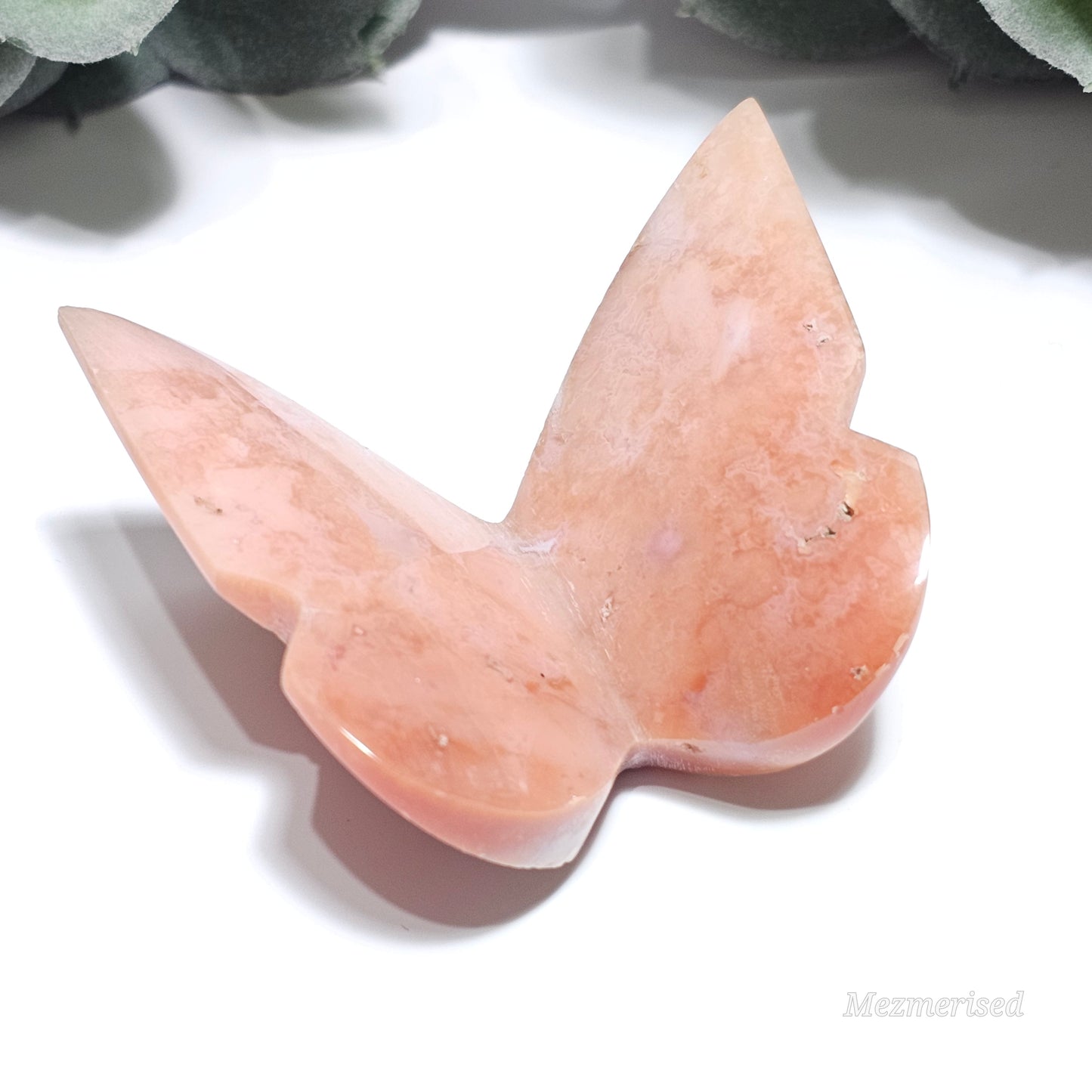 Beautiful rare pink Carnelian butterfly carving.