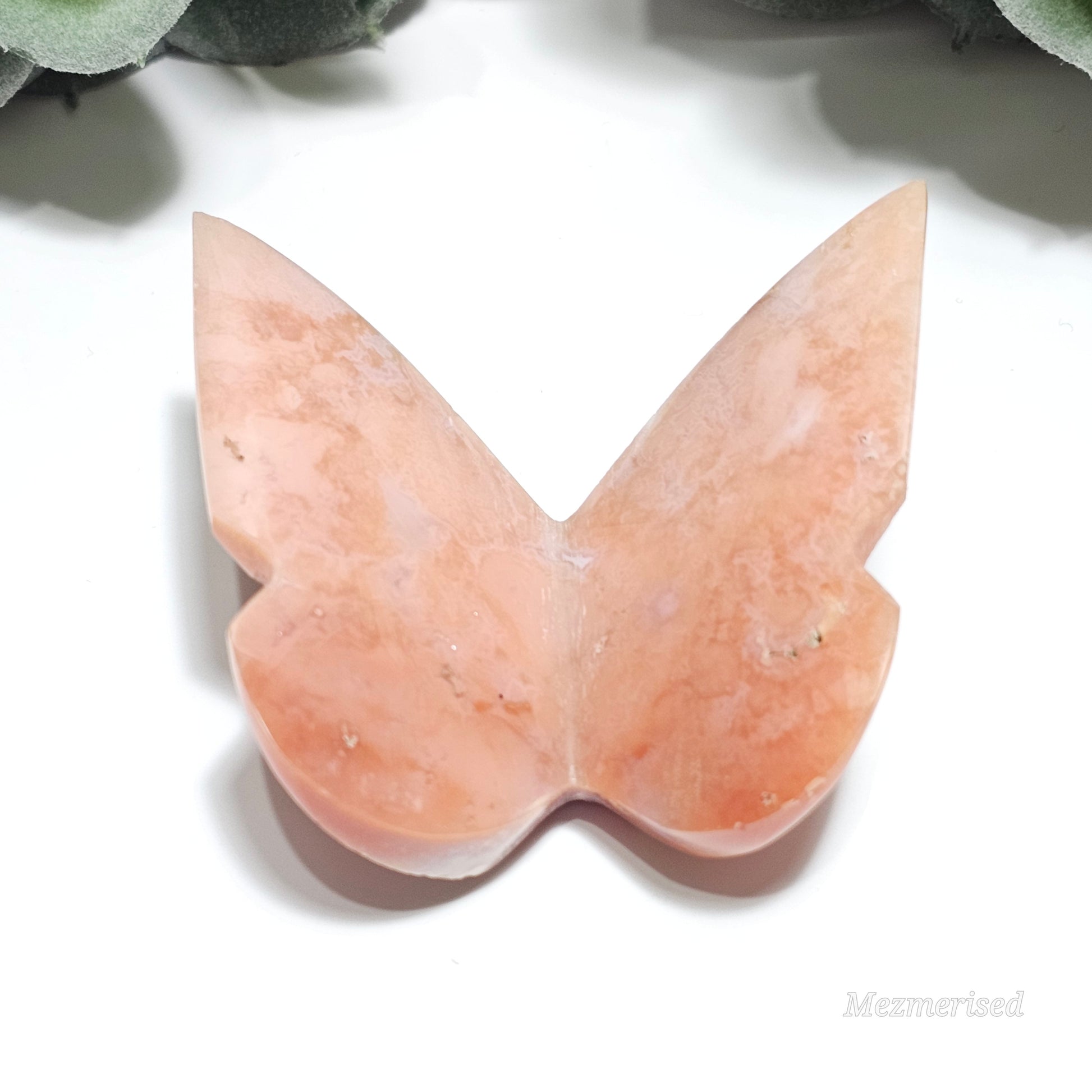 Beautiful rare pink Carnelian butterfly carving.